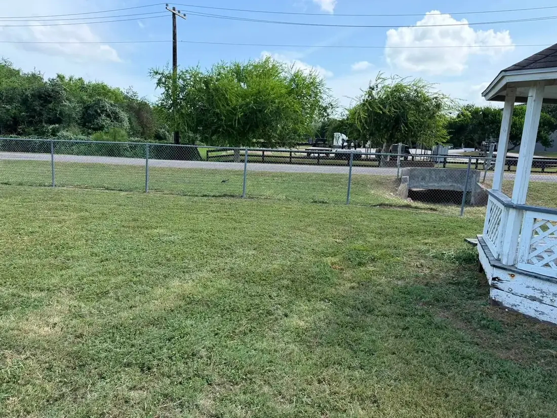 A newly picked-up commercial property with the grounds mowed to the fence line