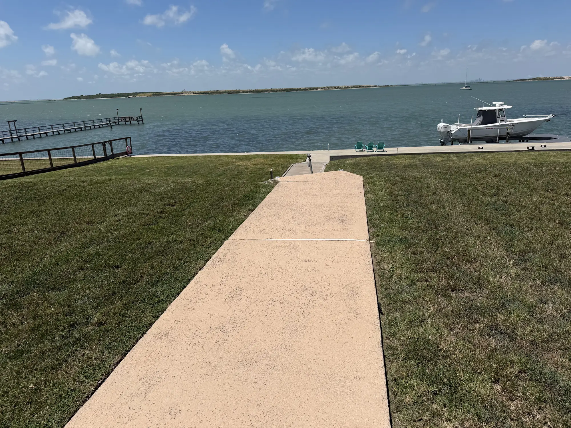 A maintained walkway leading down to the bay