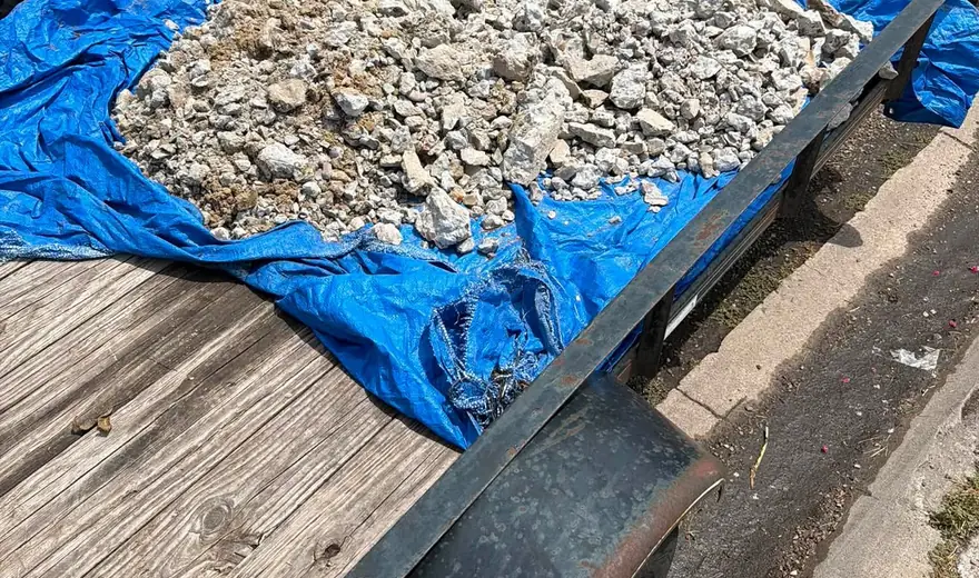 LRT's trailer loaded with broken-out concrete ready to be hauled off